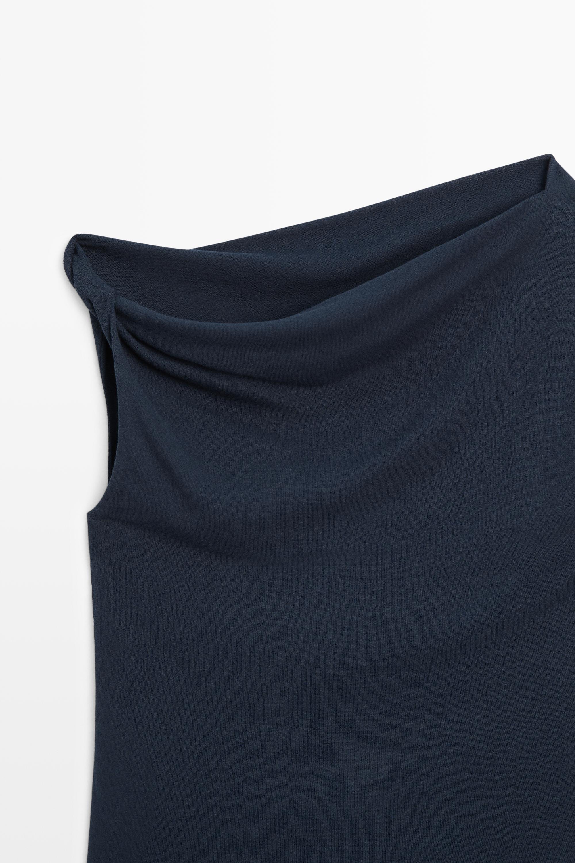 Asymmetric drop sleeve top